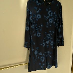 Cute little dress. Navy blue with lighter blue flowers size 2 gently used.